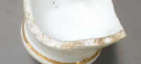 Insoluble salts on a porcelain joint surface